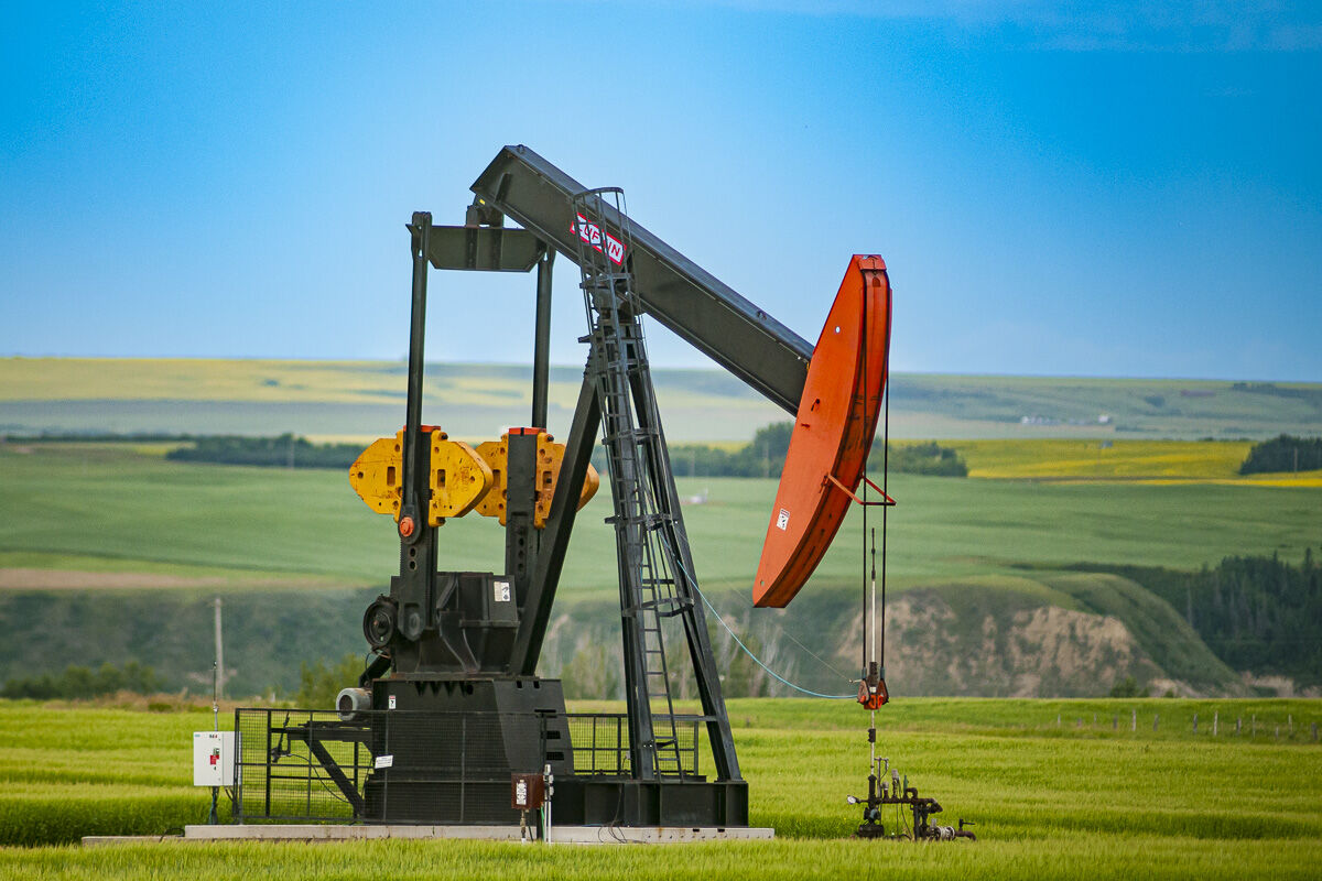 industrial-photography-pumpjack-southern-alberta A pump jack standing in an open Southern Alberta field,